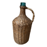 Dame jean covered in woven wicker