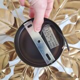 Golden metal flower sconces