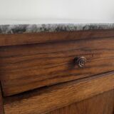 Vintage bedside table in the shape of a wooden column and a gray marble top