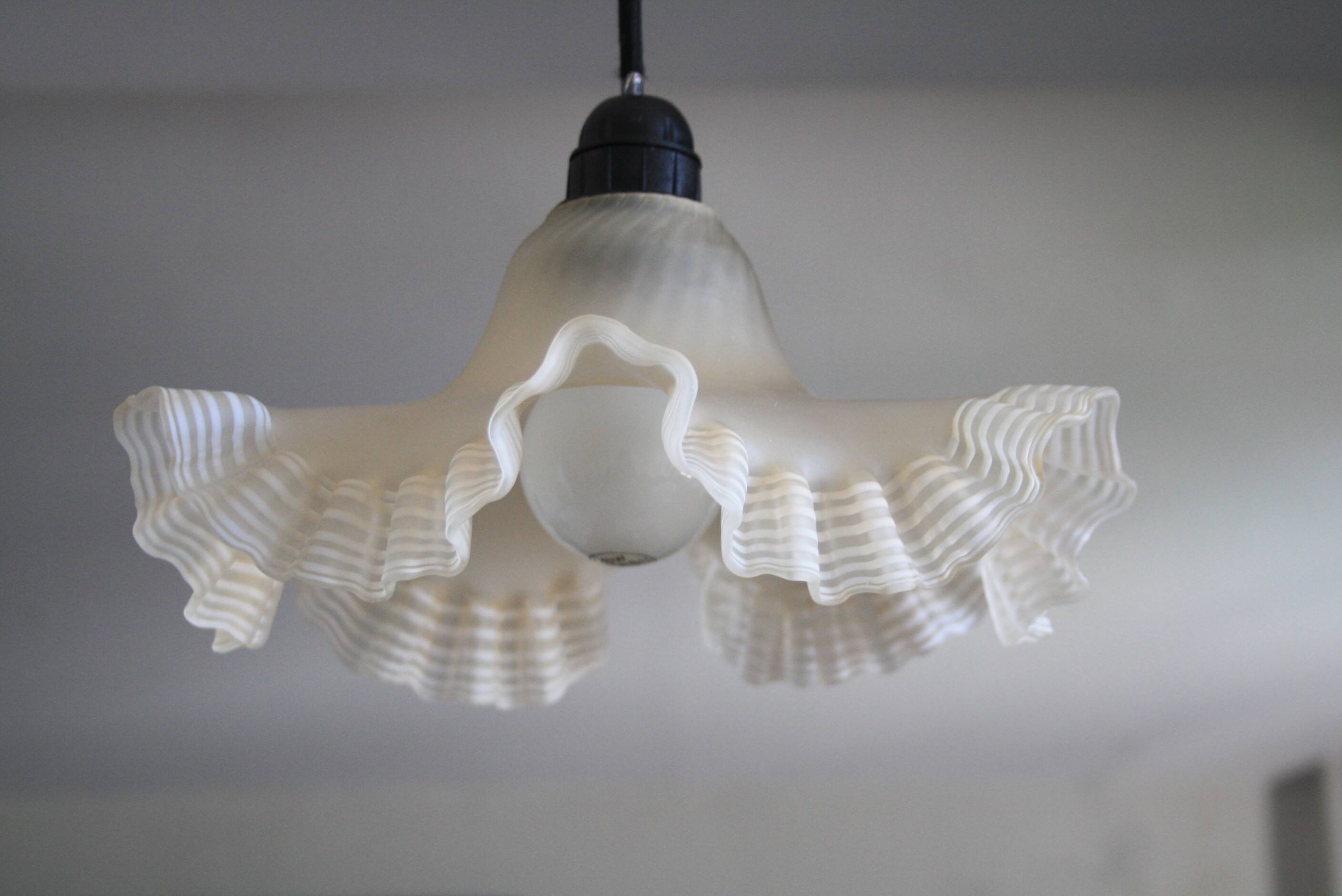Beige glass pendant light with ruffles