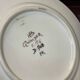 Pair of Quimper earthenware plates with pearl decoration from the 1950s.
