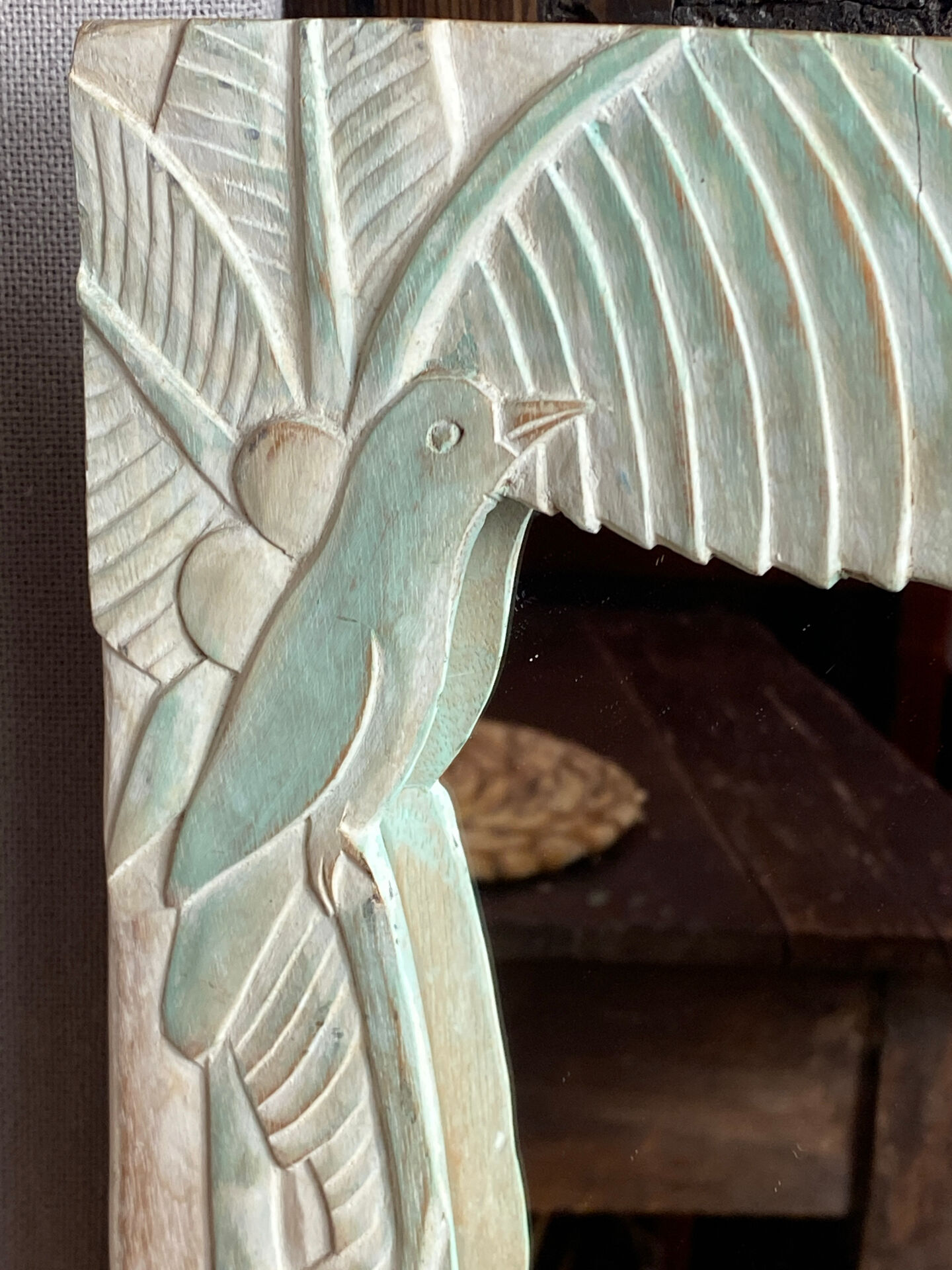 Carved wooden mirror