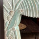 Carved wooden mirror