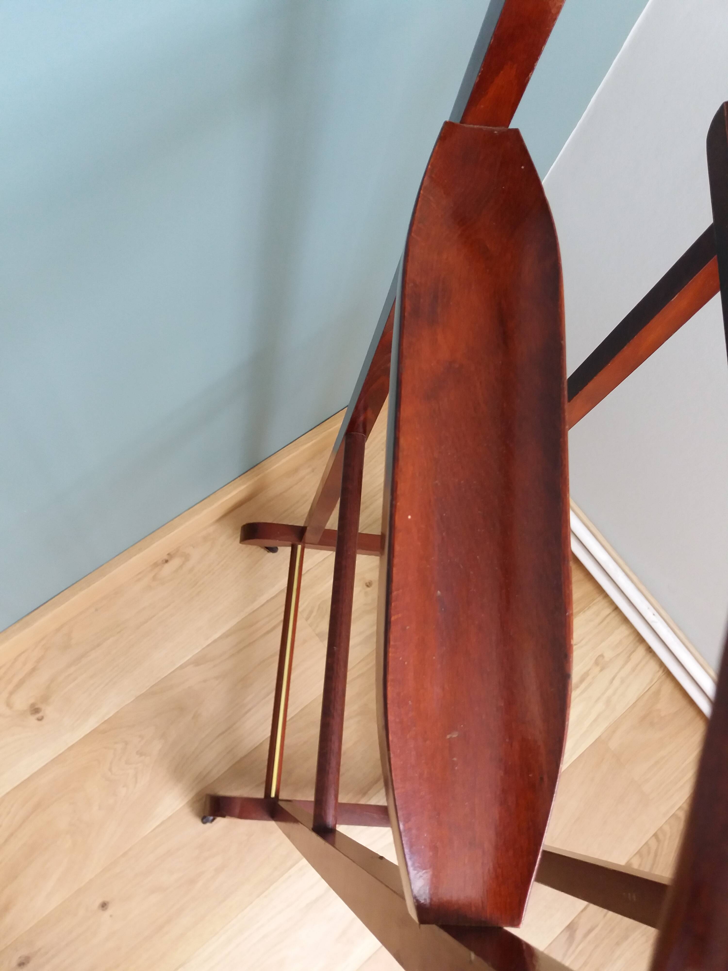 Night stand with two clothes racks