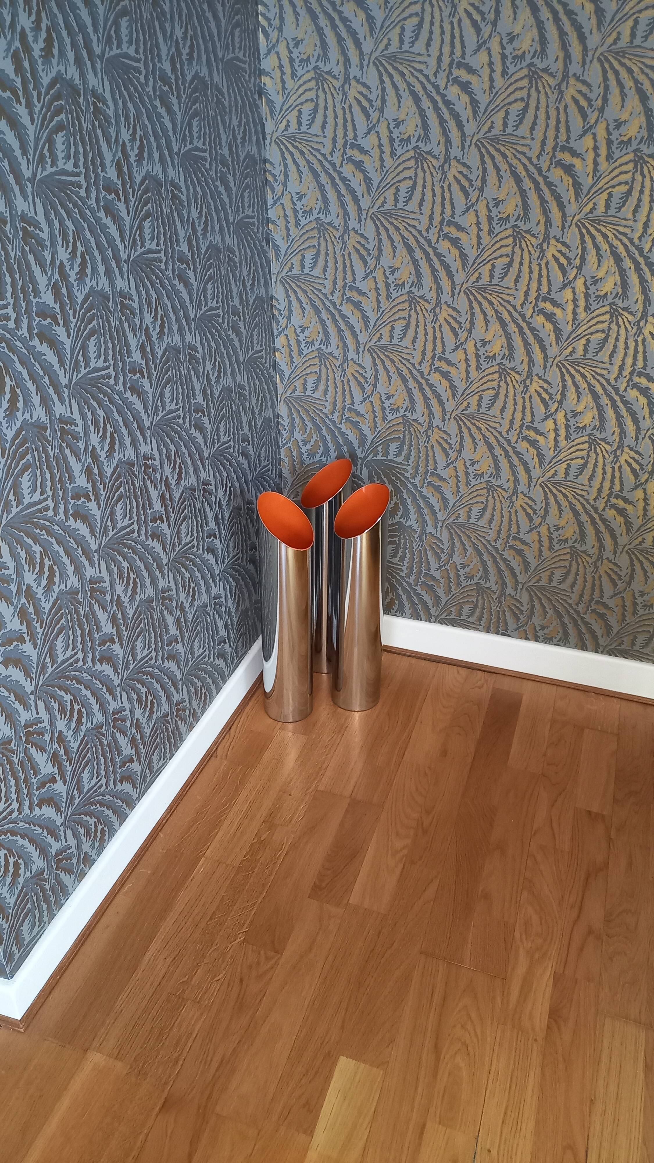 Vintage cylindrical chrome vase from the 1970s.