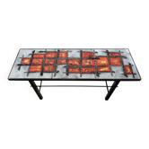Enamelled lava coffee table and lacquered metal. France, 1970s.