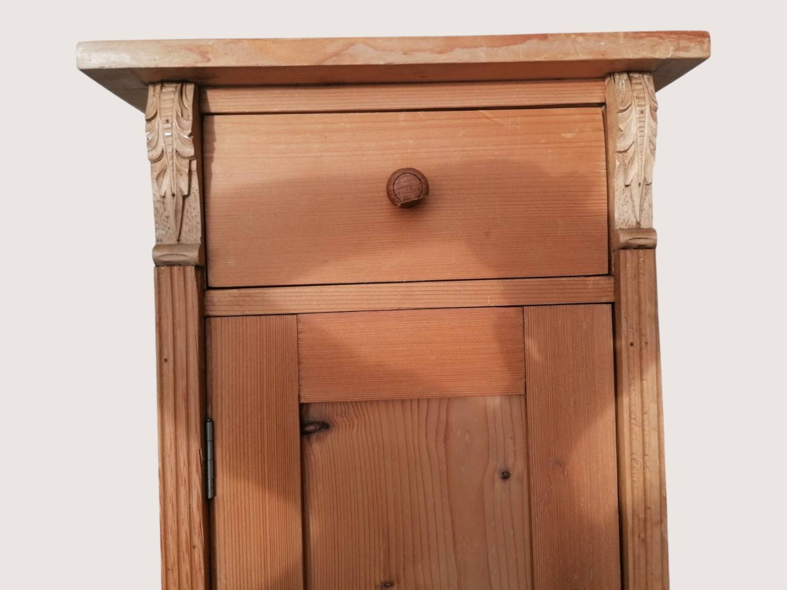Pair of moulded light wood bedside tables.
