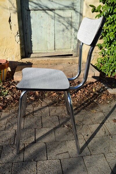 Set of table and four chairs formica