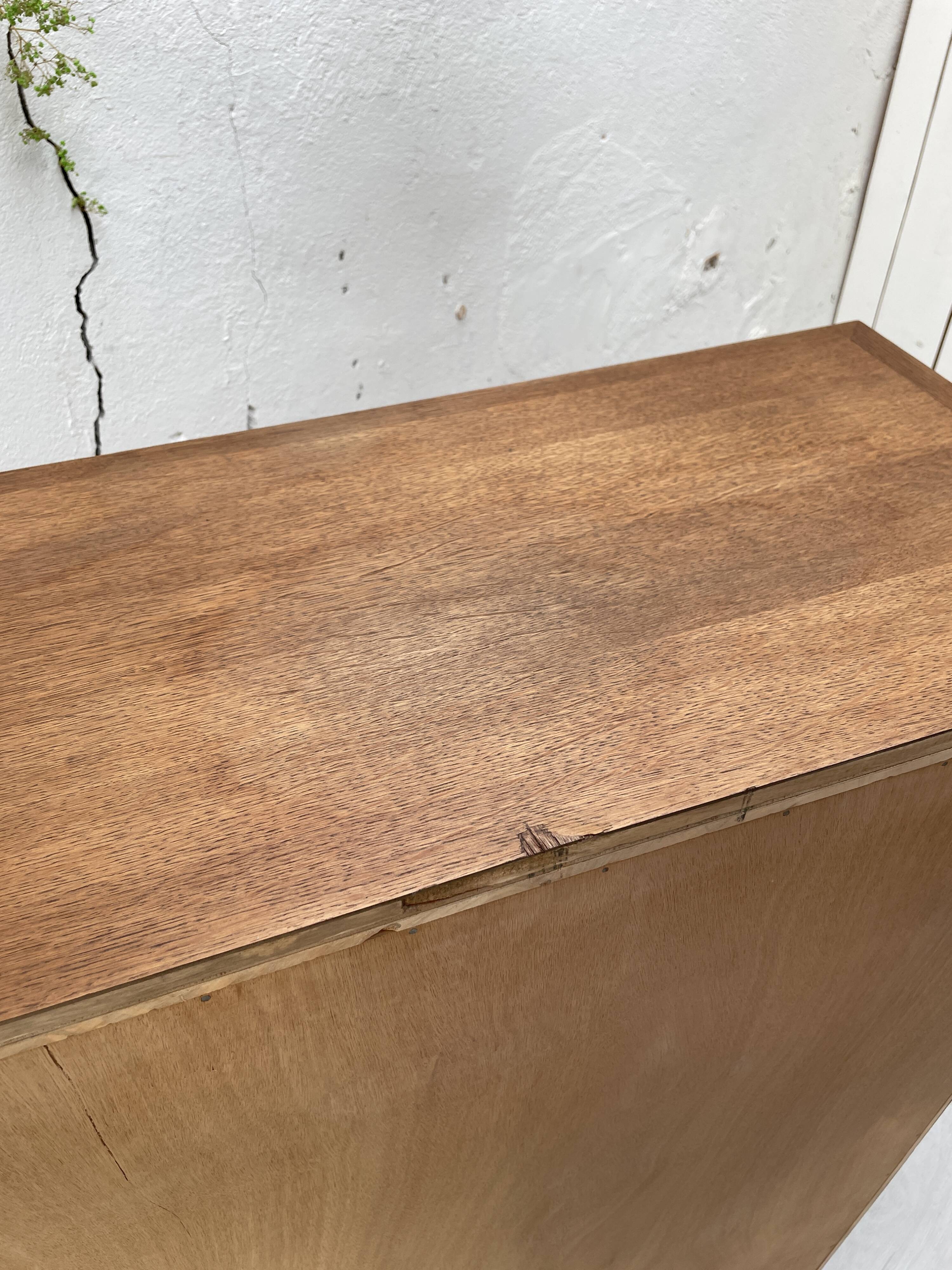 Storage unit in solid oak and veneer, circa 1960.