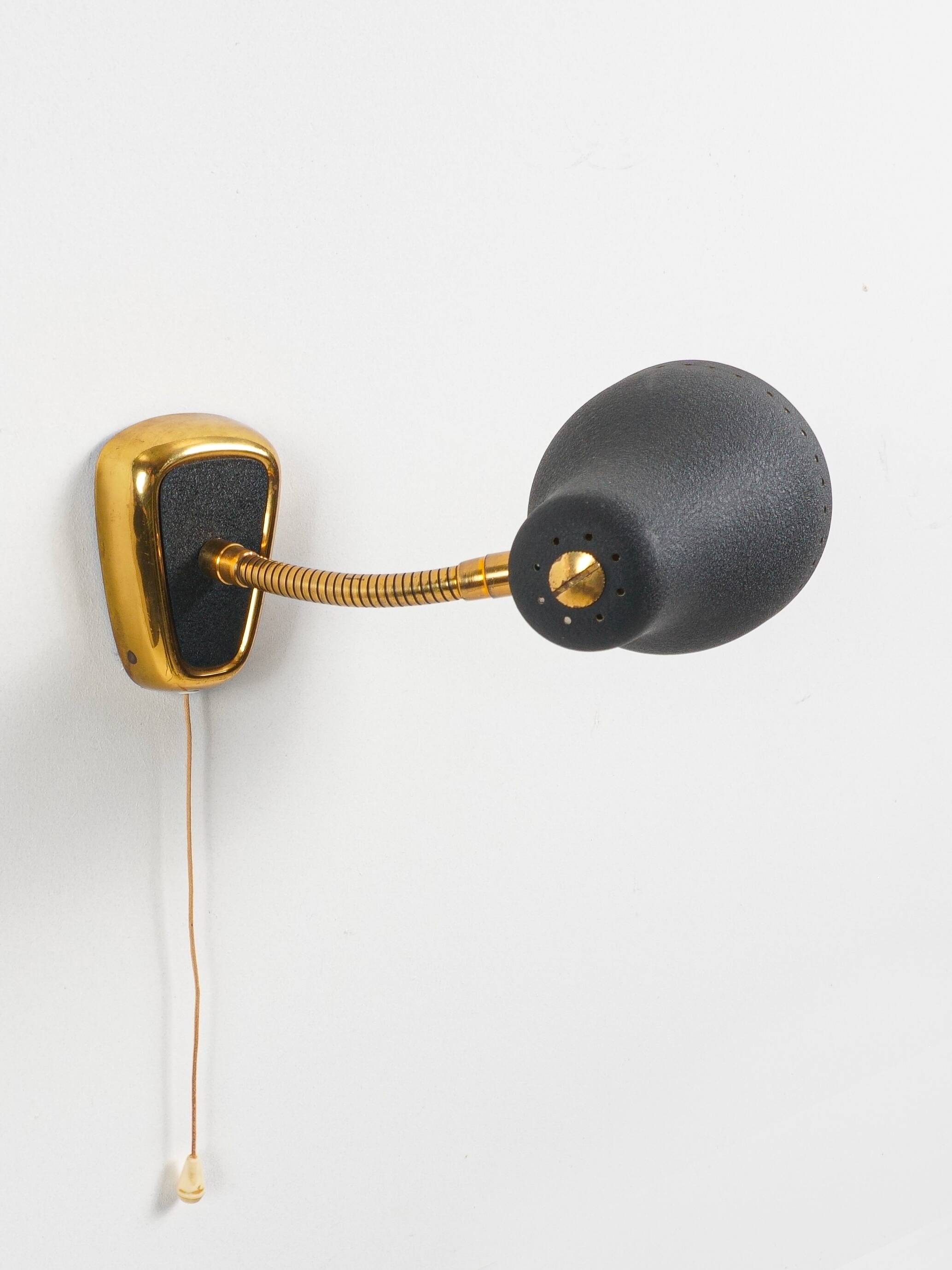 Jacques biny (designer) - pair of adjustable wall lights in brass & metal