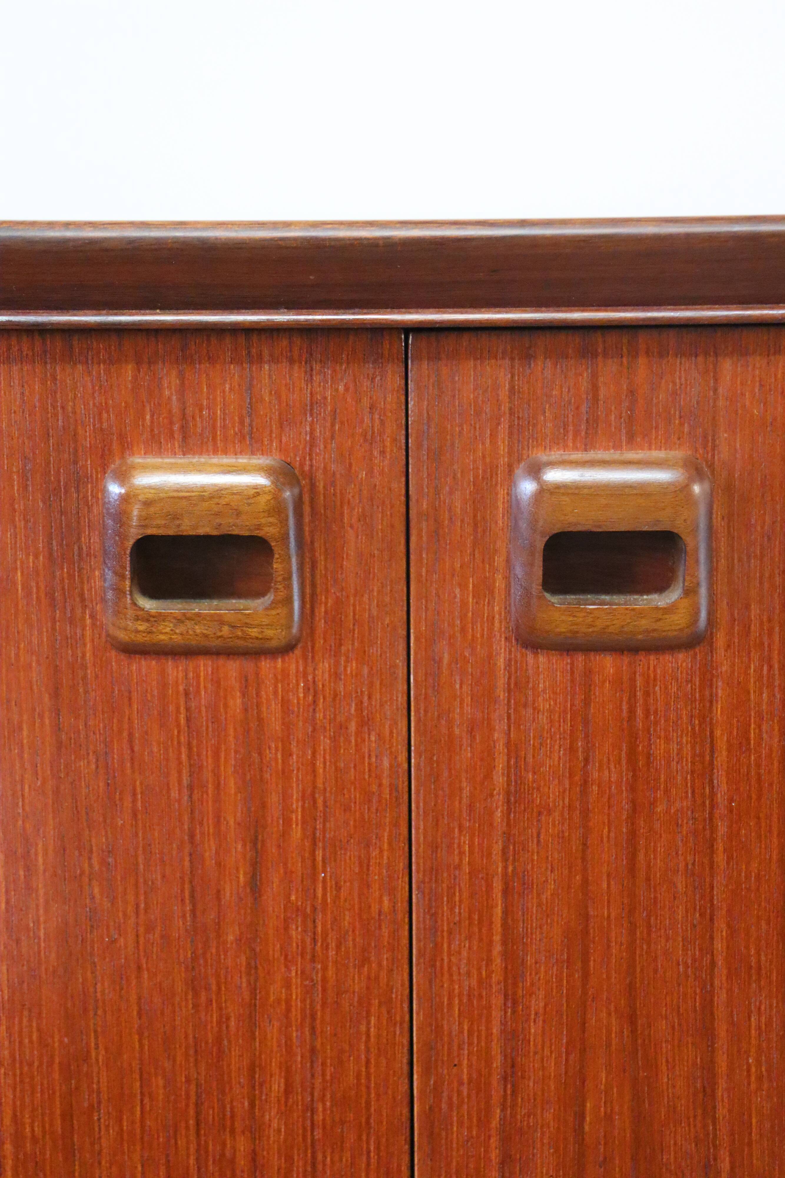 Scandinavian row in solid teak 1960