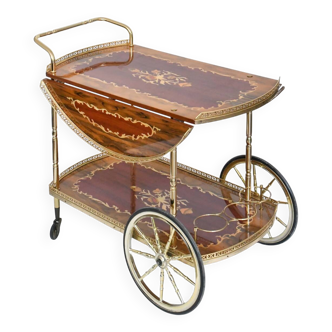 Serving table and rolling bar with drop leaves featuring floral marquetry decoration.