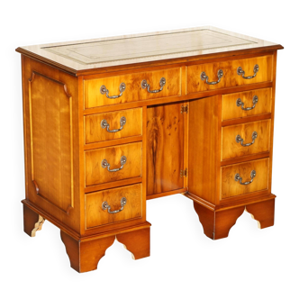 Desk with two drawers made of curly yew wood and leather.