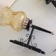 Pair of vintage iron and smoked glass