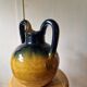 Pottery, jar, old jug in yellow and green glazed terracotta
