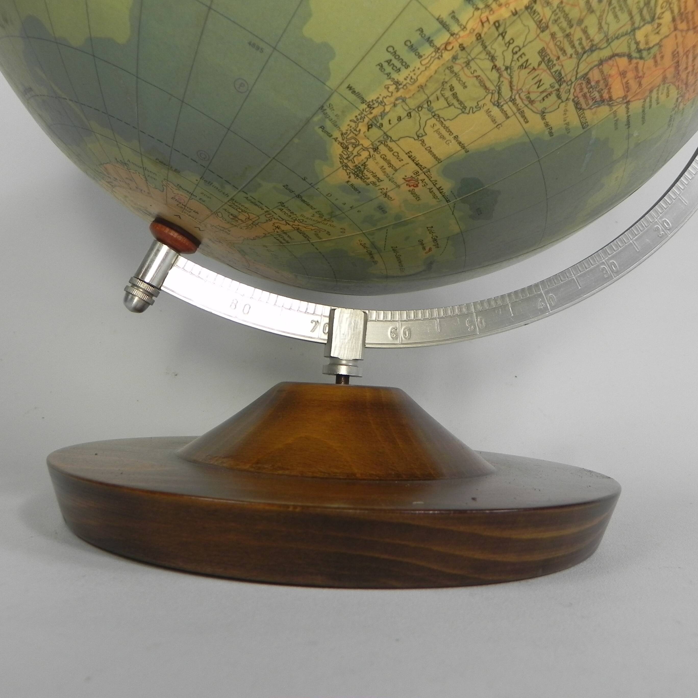 Paper mache globe on a wooden base, 1975