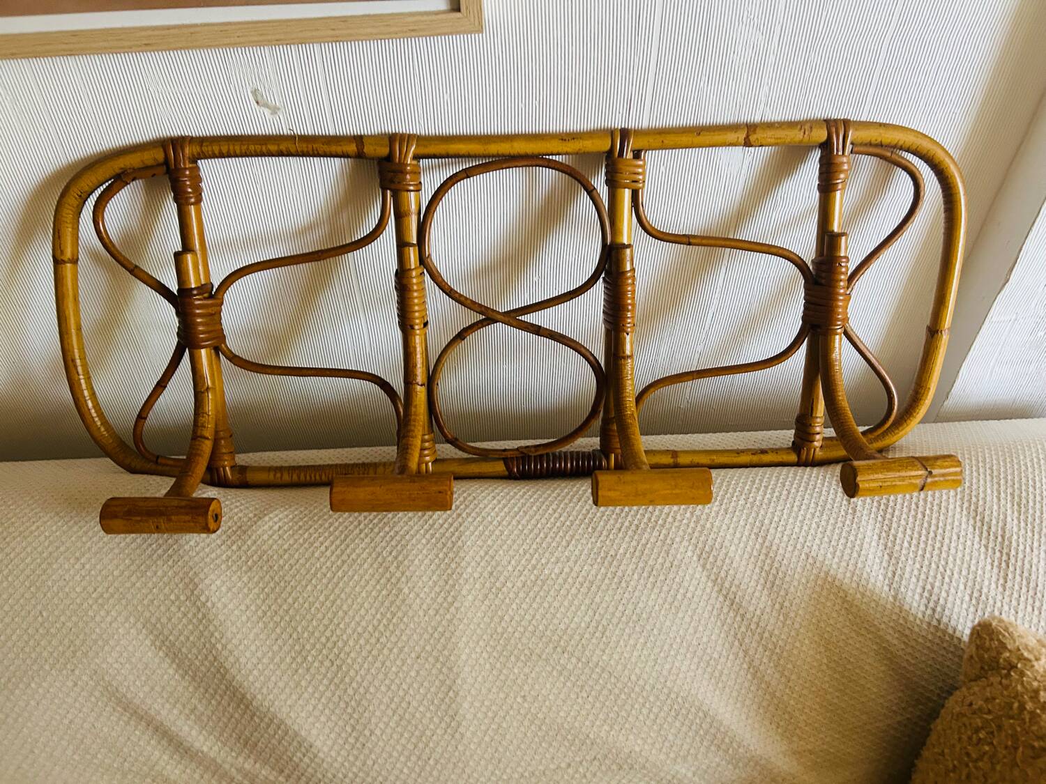 Vintage rattan wall-mounted coat rack