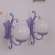 Wrought iron wall lights and glass spheres x2