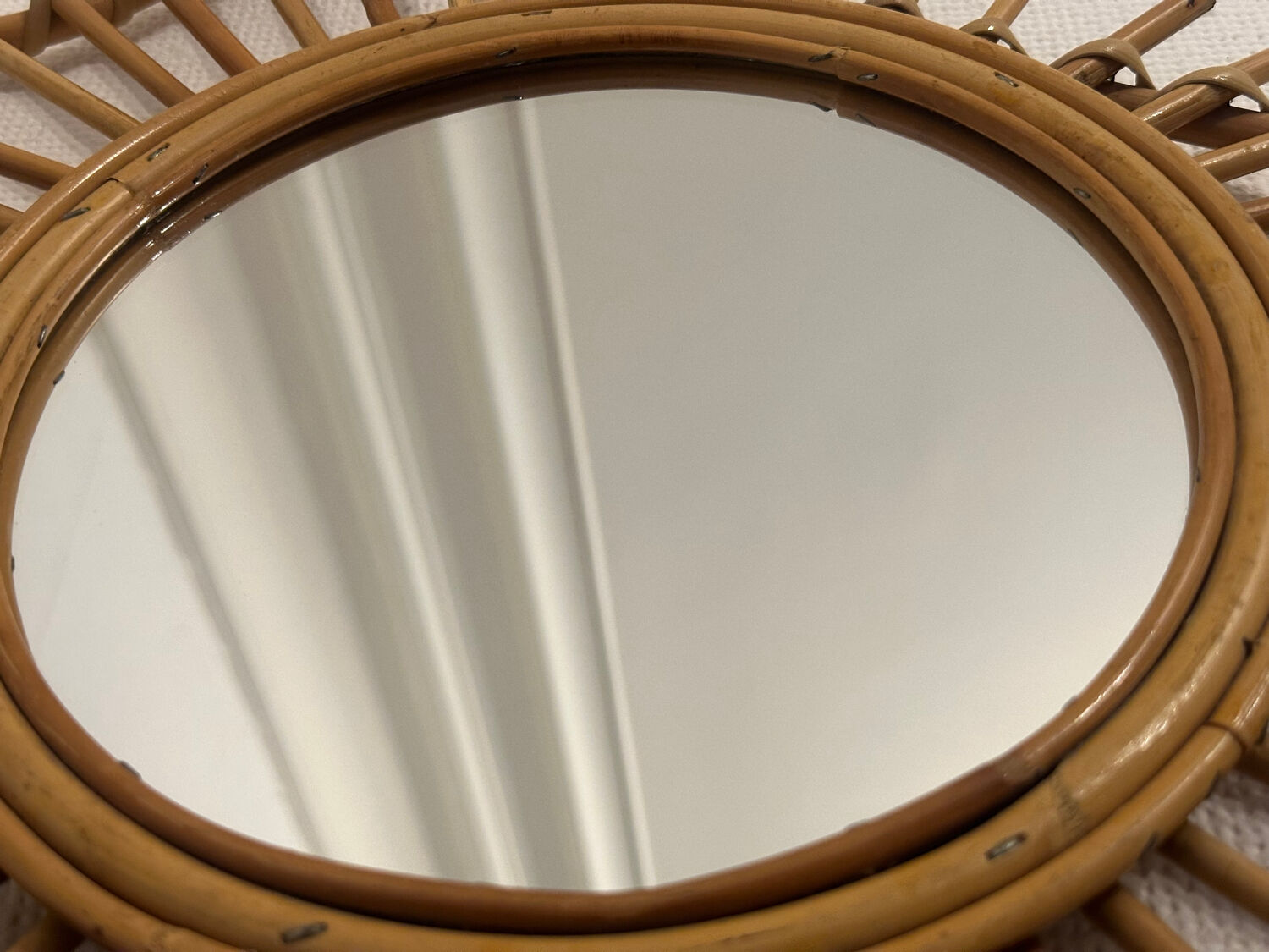 The vintage guitar rattan mirror.