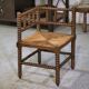 Pair of turned wooden corner chairs from the 1950s.