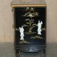 Decorative Chinese buffet in Chinoiserie style in lacquer and steatite.
