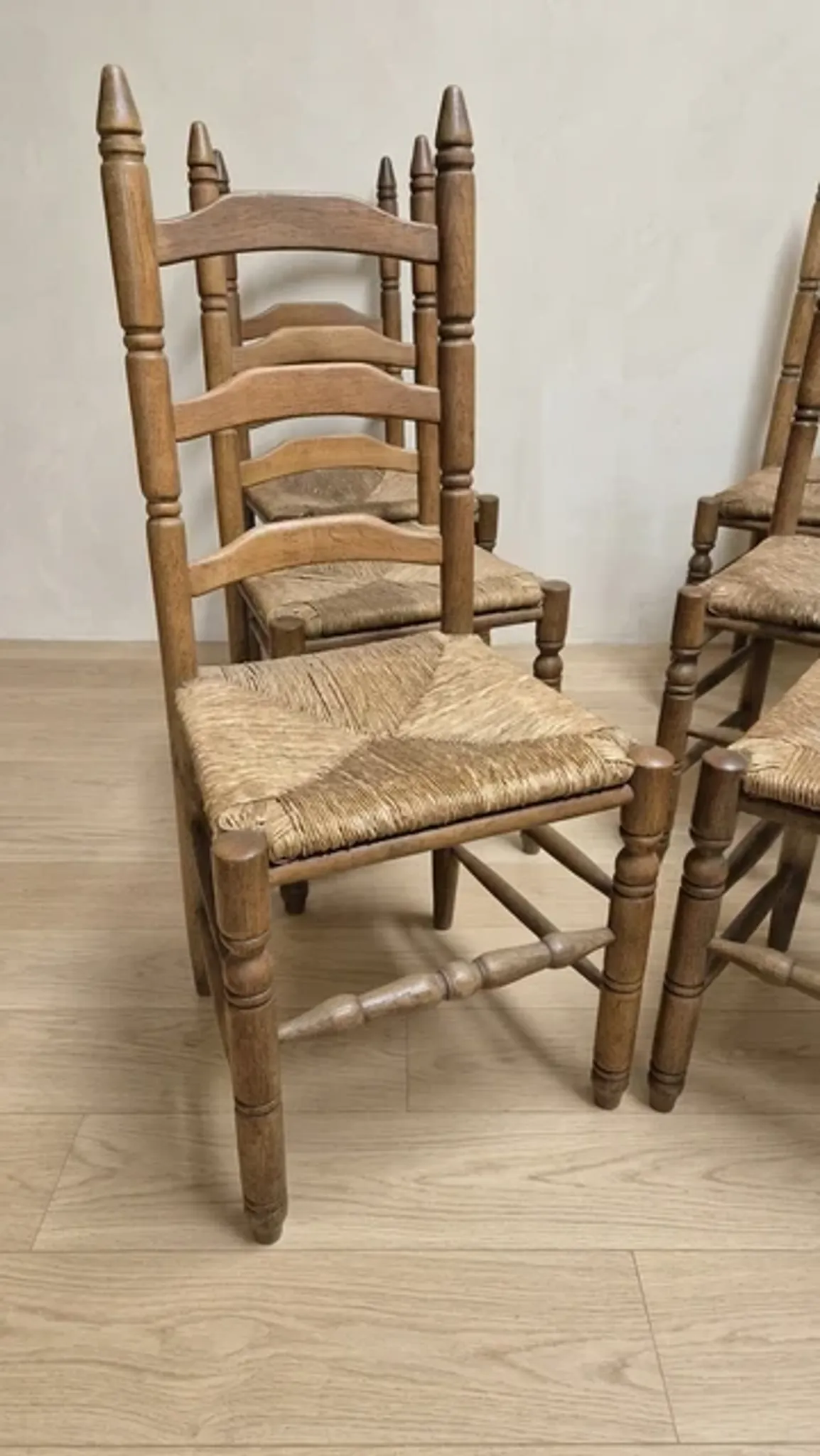 Set of 6 vintage wooden ladder-back dining chairs with woven seats, 20th century, 105 × 38 cm
