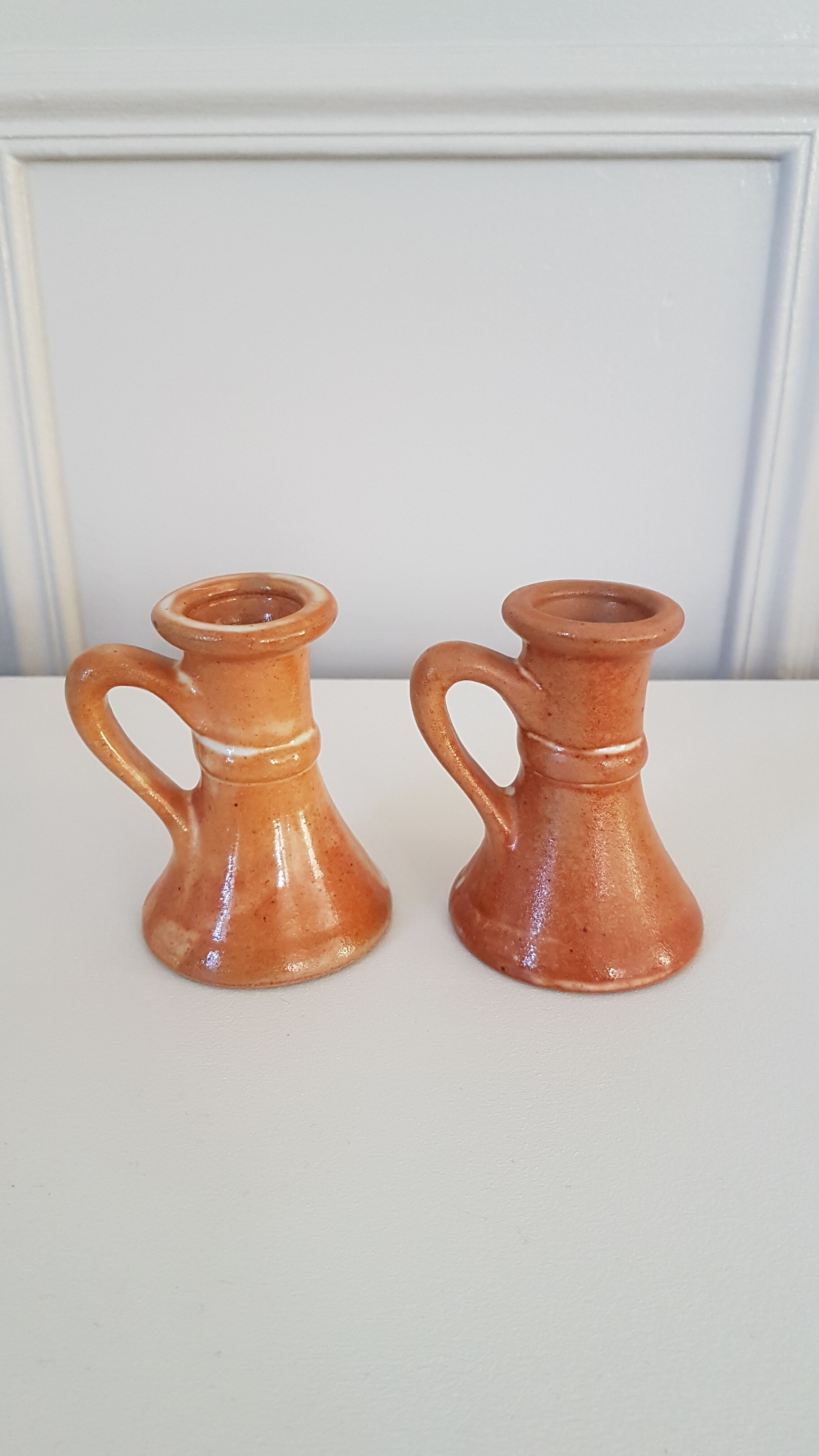 Duo of stoneware candle holders