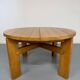 Extendable round table Maison Regain in solid elm, 1970s design.
