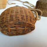 Trio of woven wicker bottles