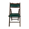 Folding wooden chair and green skaï
