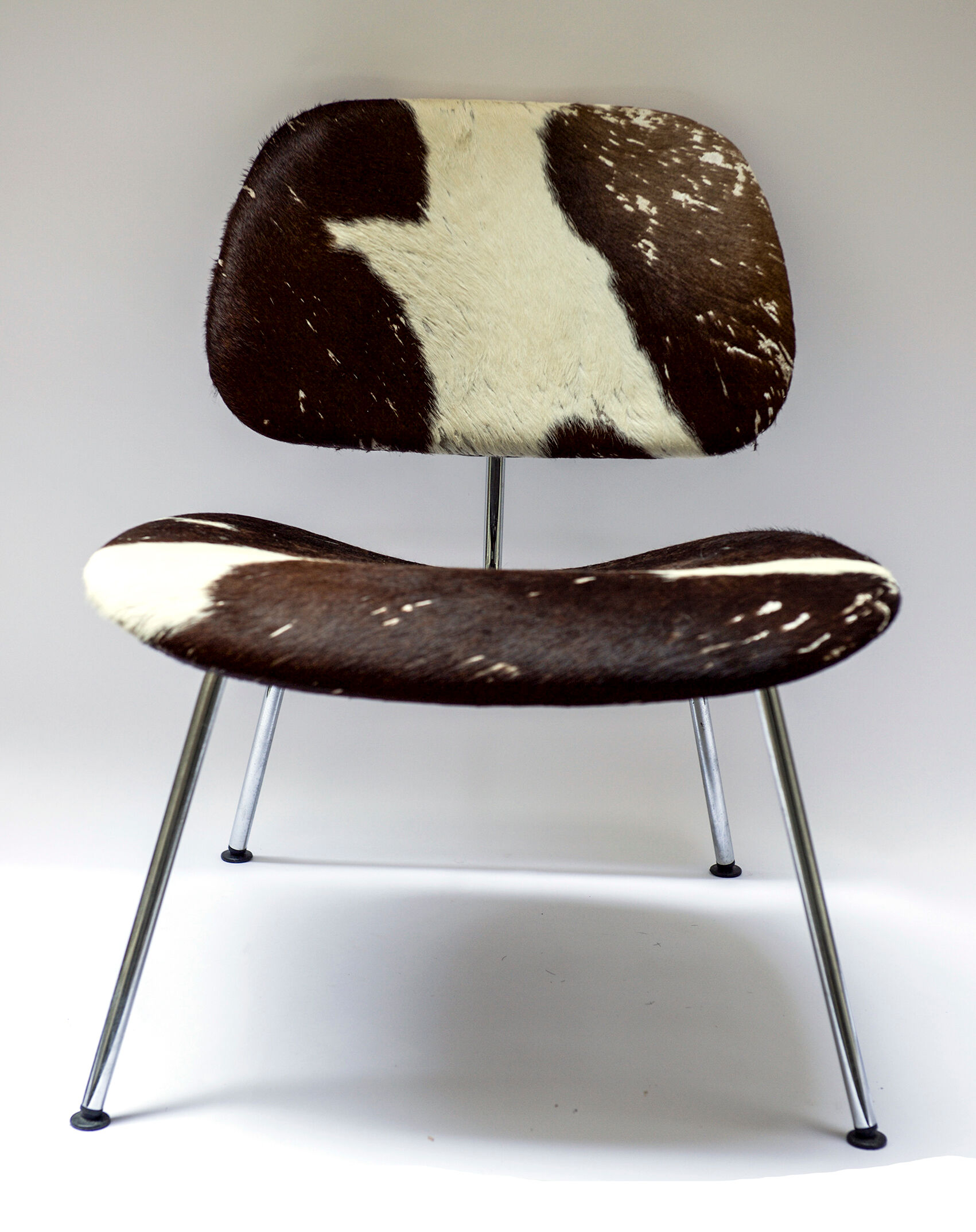 Lounge chair by Charles and Ray Eames "LCM" calfs skin