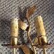 Wall lamp in gold metal
