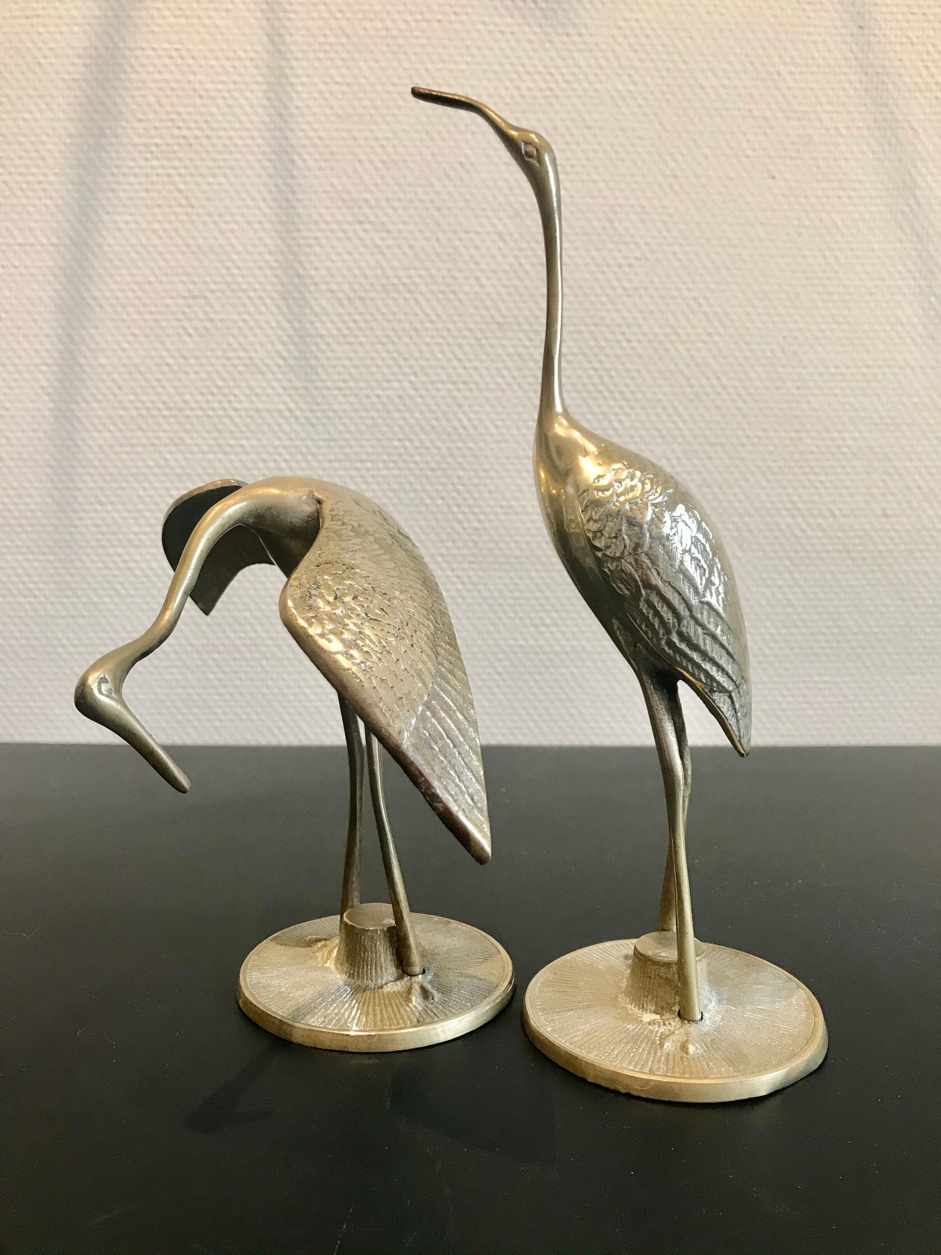 Couple of brass birds