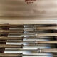Service 12 silver metal knives
