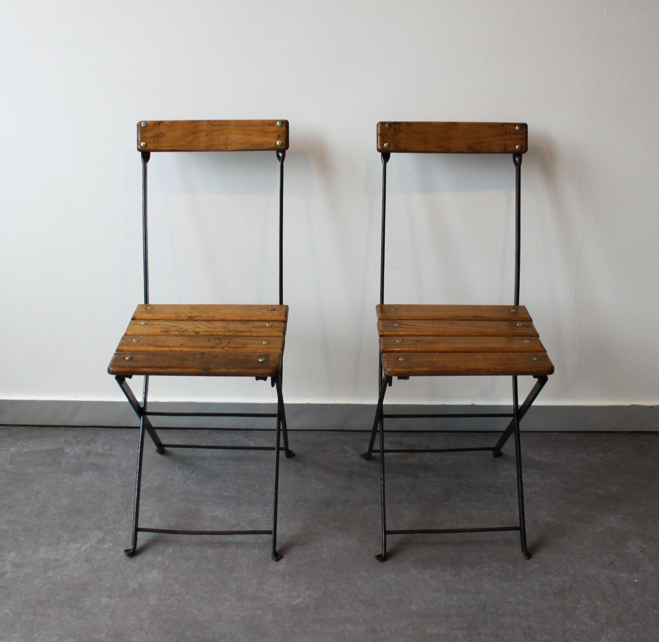 Pair of folding bistro chairs, France, 1930