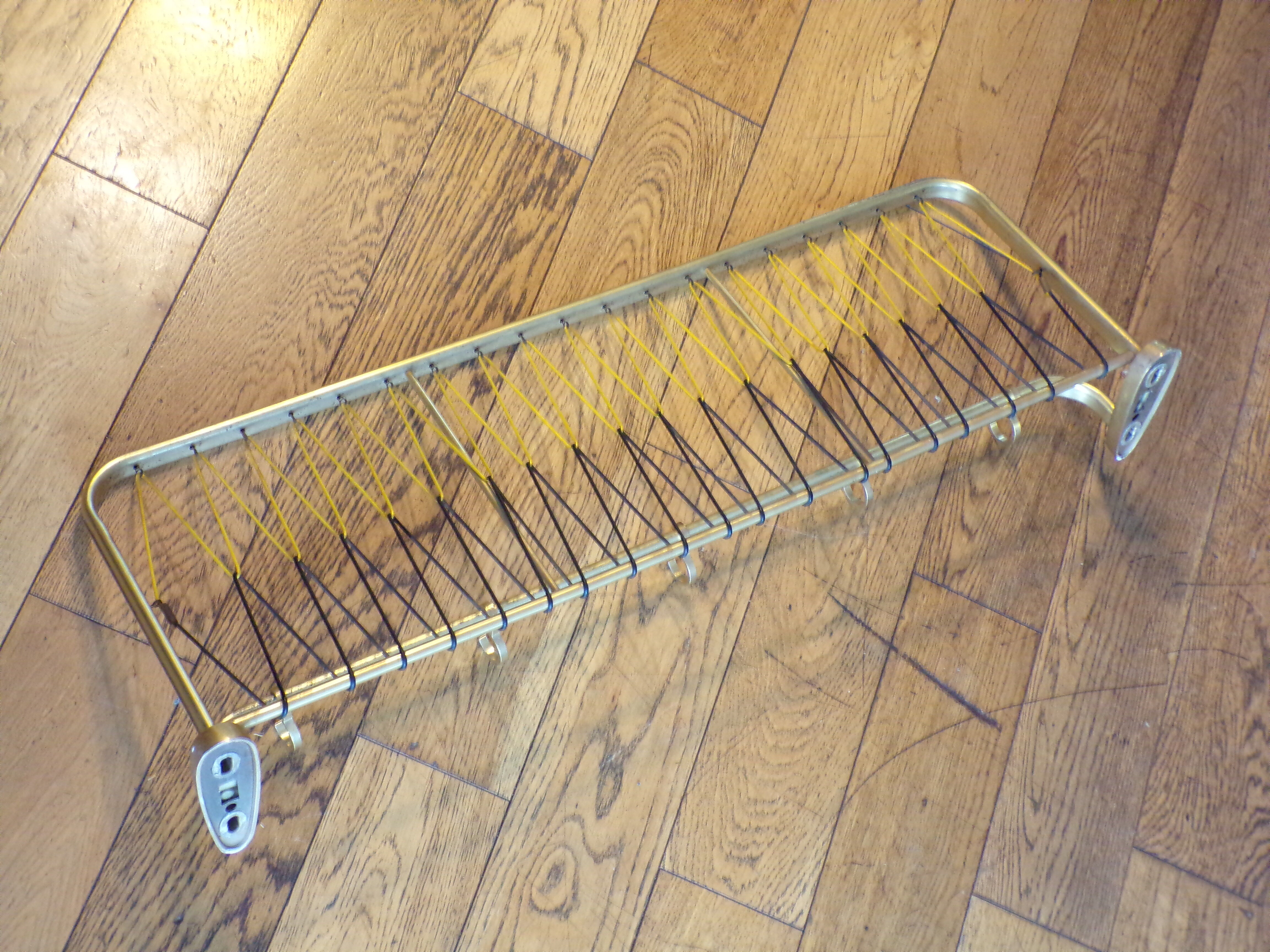 Vintage coat racks like train luggage racks