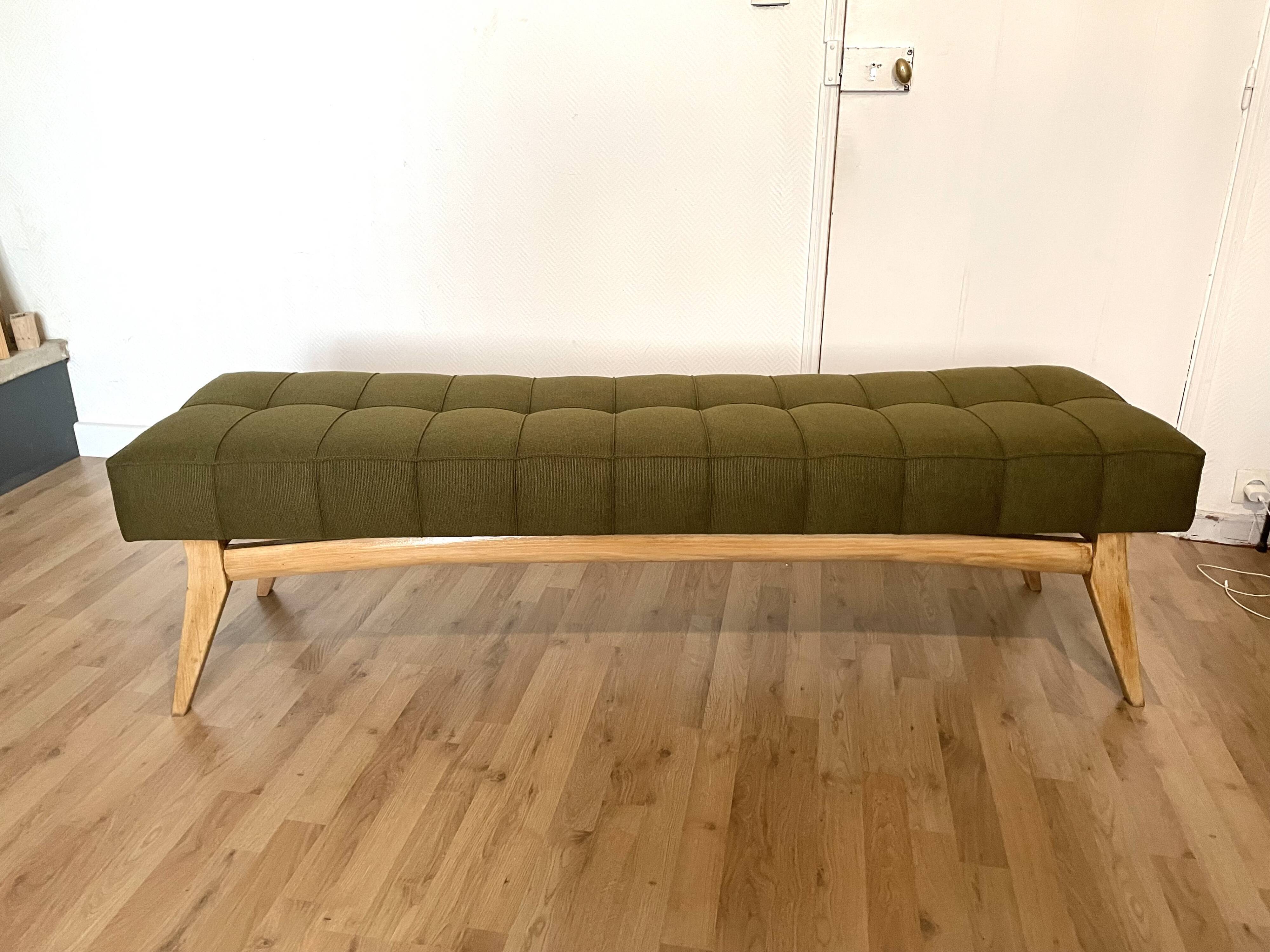 Wooden bench and green fabric