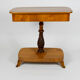 Danish Biedermeier elm occasional table with carved base and drawer