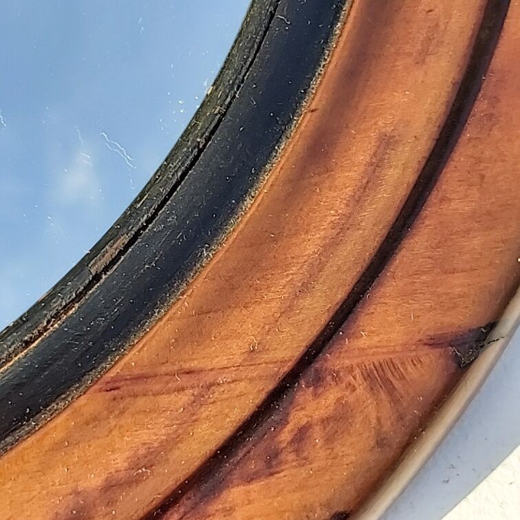 Old wooden round mirror