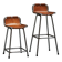 Set of 2 stools "Les Arcs" selected by Charlotte Perriand in leather.