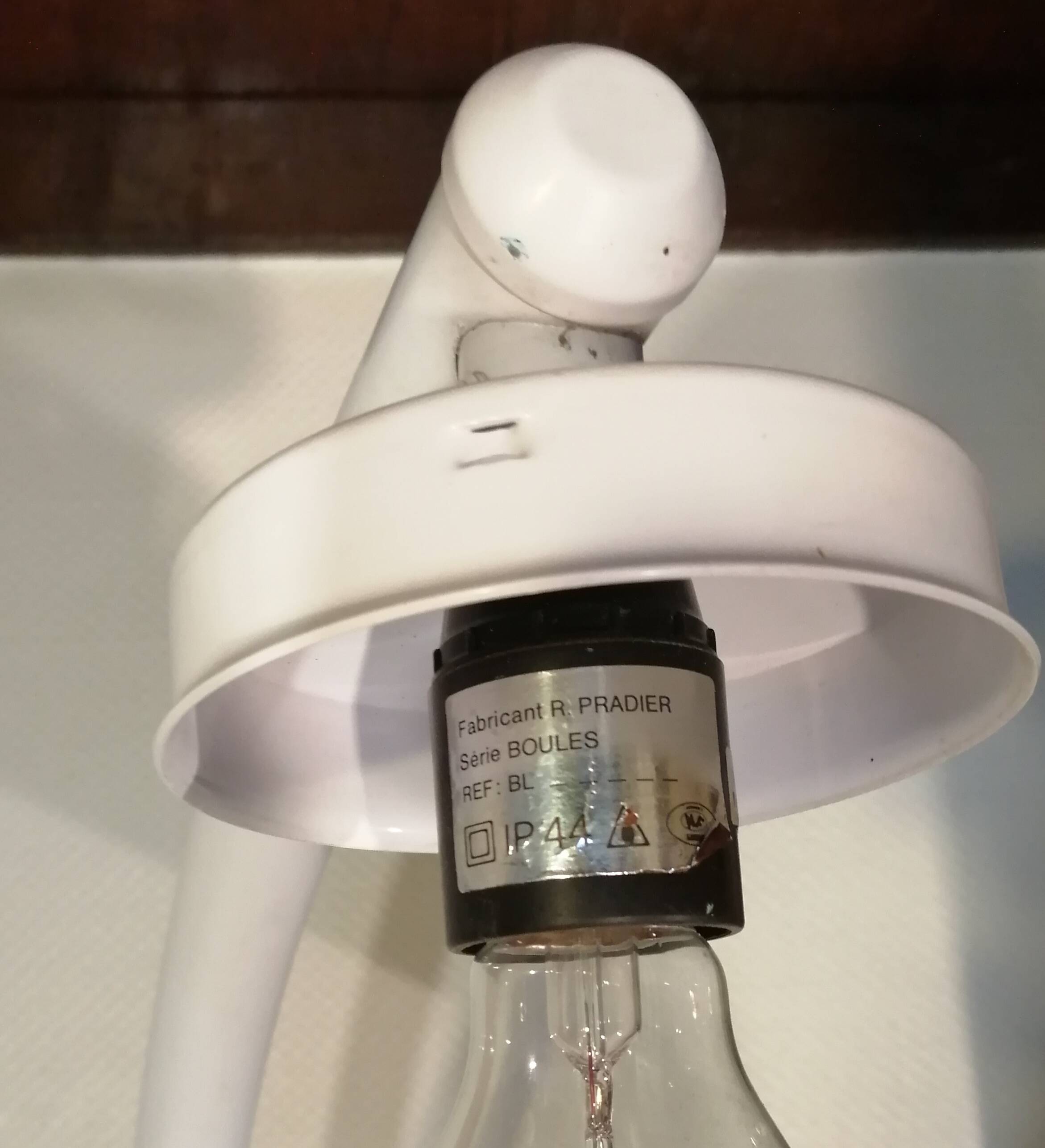 Adjustable metal floor lamp with its vintage smoked ball model from Roger Pradier 1970