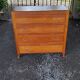 Chest of drawers of the 50s in oak compass feet 4 drawers