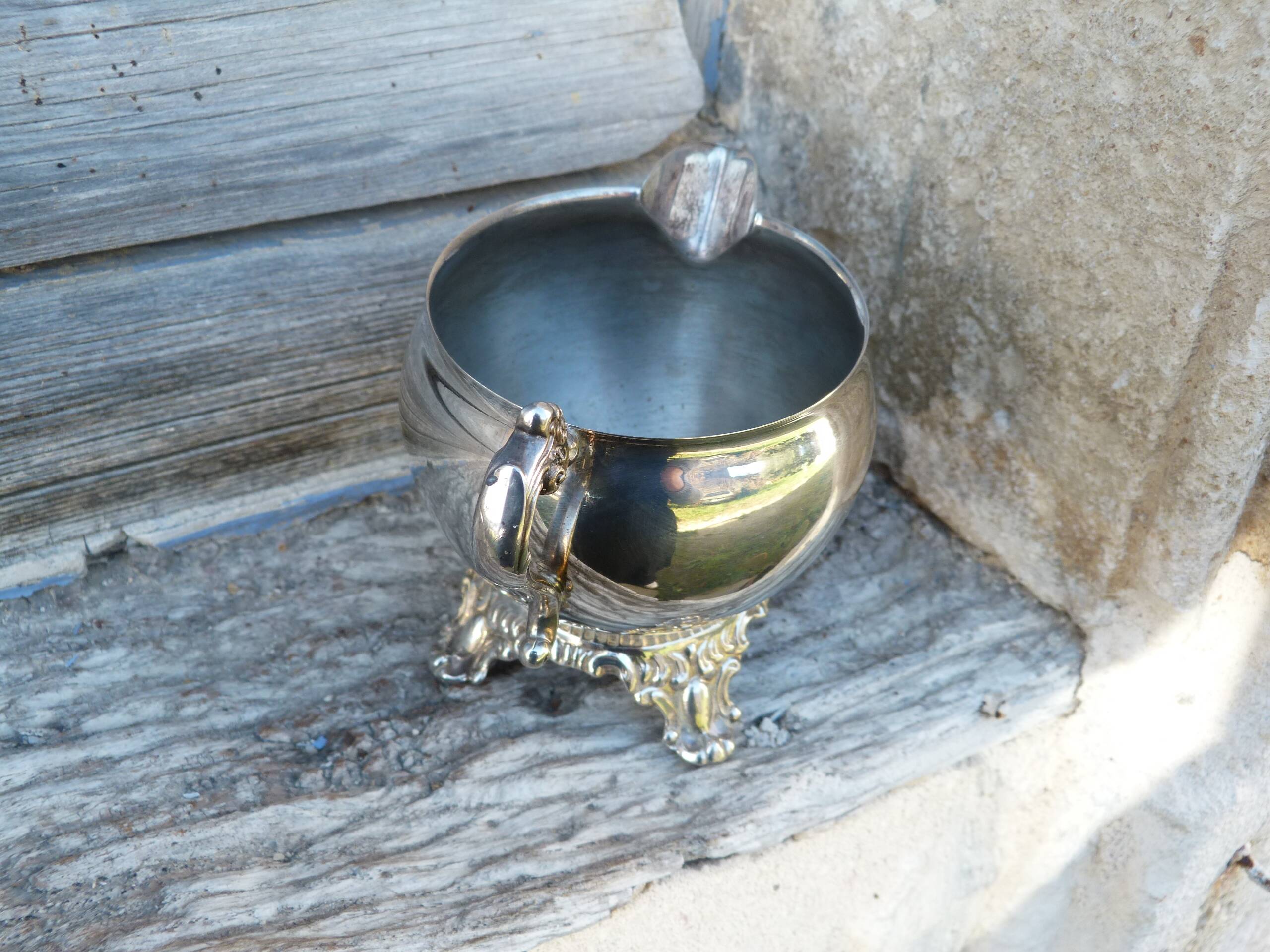 Old silver-plated metal milk or cream jug