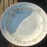 Set of four hollow Limoges porcelain plates signed Robert Haviland & Le Tanneur