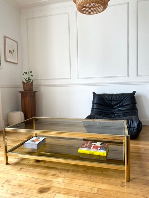 Gold metal coffee table and smoked glass