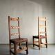 2 brutalist carved wood dining chairs with leather seat | The Netherlands | 1970s