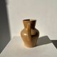 Small pitcher in light beige sandstone