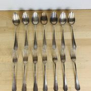 7 vintage silver plated forks and 7 spoons