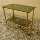 Antique brass serving trolley with smoked glass top, Louis XVI style.