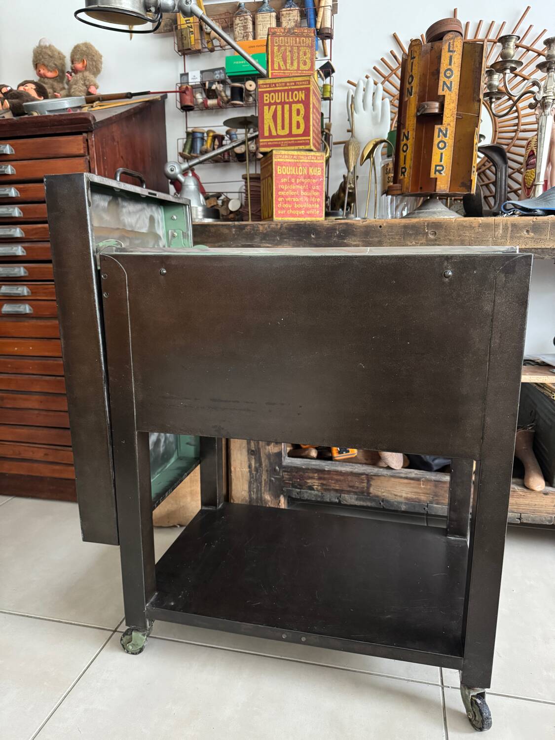 Old vintage industrial filing cabinet on wheels